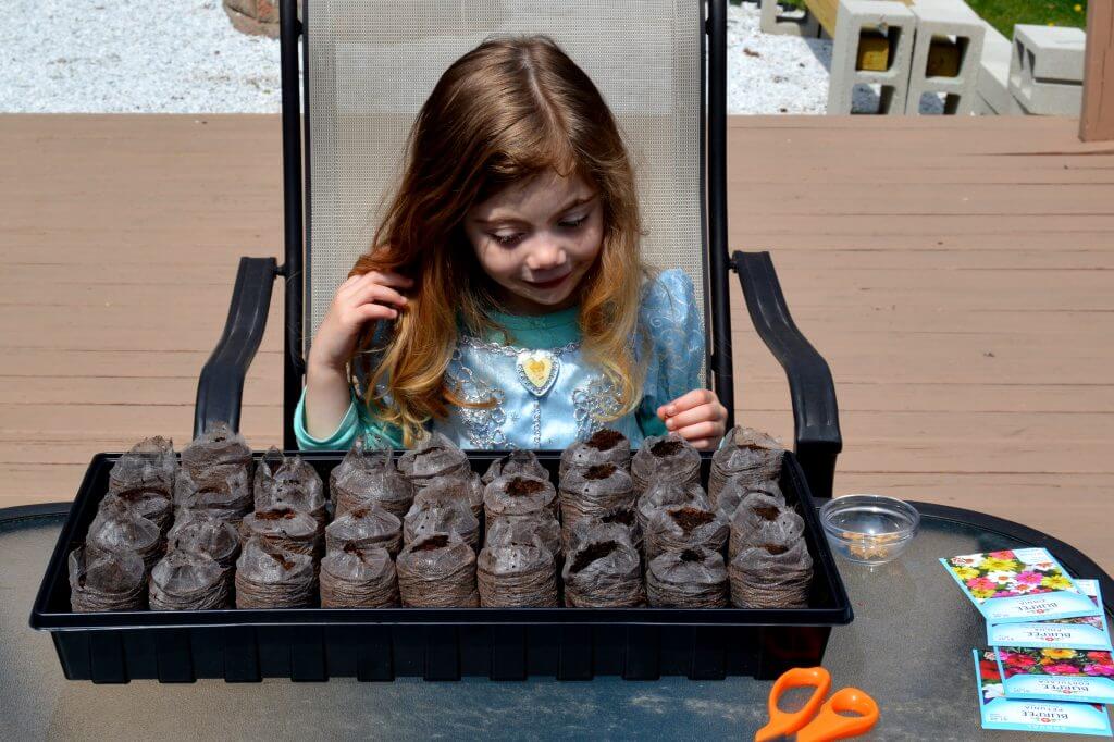 Managing a garden is a great way for kids to learn responsibility and care of the earth. Here's how we got started with growing from seed.