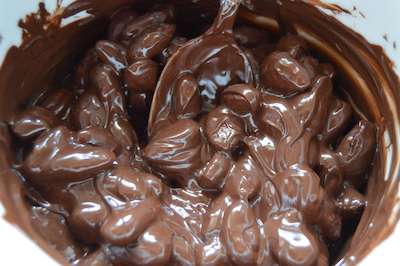 Add almonds to dark chocolate mix
