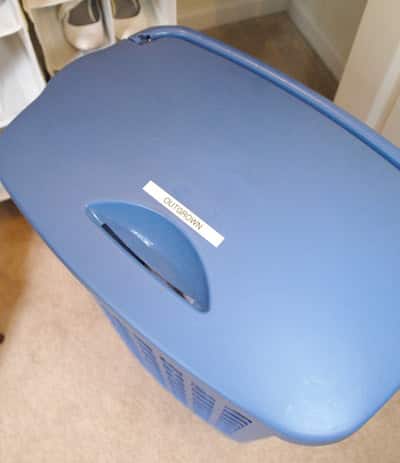 Laundry bin for outgrown clothes